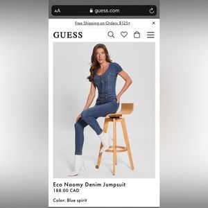 Guess denim jumpsuit in medium size NWOT